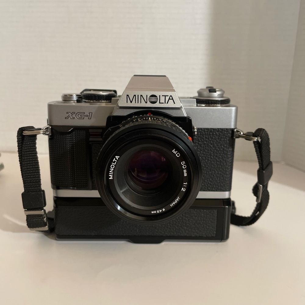 Minolta XG-1 35mm SLR Film Camera With an MC 50mm 2.8 Lens And Motor drive.